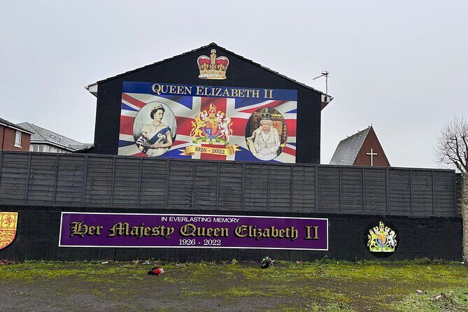 2 Hours Republican & Loyalist Mural Black Taxi Tour from Belfast - International Mural Wall on Divis Street: the opening punch