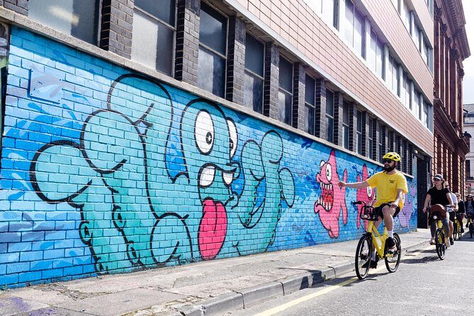Belfast Bike Tours - Holy Lands, River Lagan, and St George’s Market: where the senses get loud