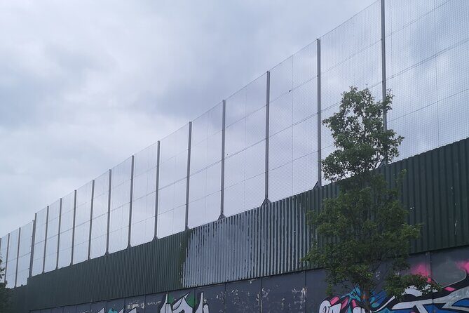 Belfast black taxi tours - Stop 1: International Mural Wall on Divis Street (Wall Art With Worldwide Meaning)