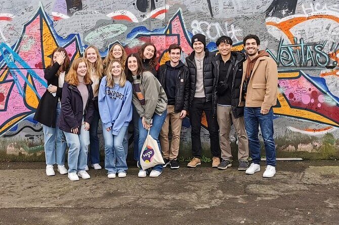 Belfast's Political Mural Taxi Tour - Stop 2: International Mural Wall on Divis Street for photos and questions