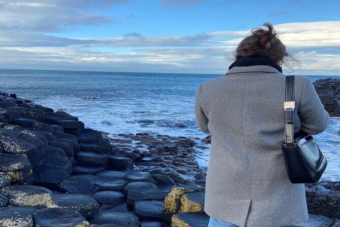 Giants Causeway, Rope Bridge, Carrickfergus Castle and Dark Hedges Tour - Dunluce Castle: A Fast Cliff Stop Worth the View