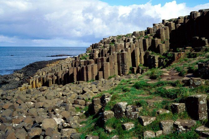 Luxury Tours Belfast. Full day Private Hire Tour for 2- 6 people - Dunluce Castle at sunset: quick stop, big payoff photos