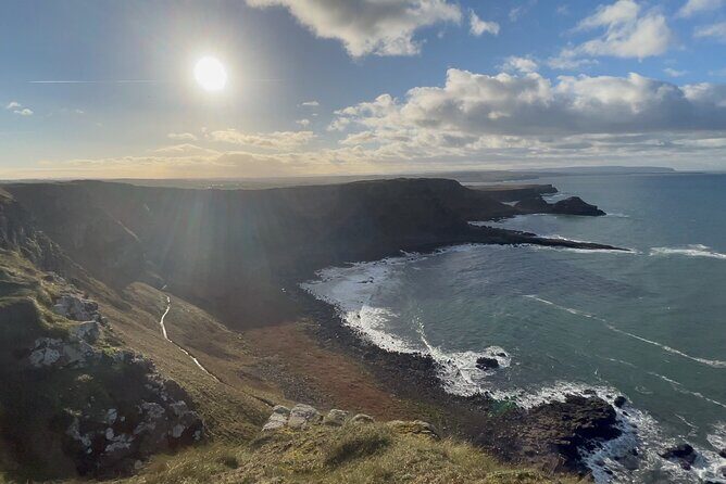 Private Belfast Mural & Giant's Causeway Tour from Belfast (2 in 1) - Dunluce Castle ruins: quick walk, big atmosphere, easy photos