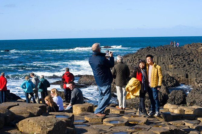 (Small Group) Shore Tour from Belfast: Giant's Causeway and Belfast Day Trip - Dunluce Castle: a 10-minute cliff-edge photo stop with real context